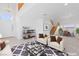 Bright living room with soaring ceilings, a modern rug, and stylish furnishings at 5396 Valley Wells Way, Las Vegas, NV 89113