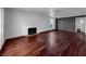 Bright living room with wood flooring and fireplace at 540 Tam O Shanter, Las Vegas, NV 89109