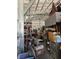 Interior of large metal garage loaded with boxes, furniture, and equipment at 5515 Coley Ave, Las Vegas, NV 89146