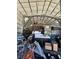 Interior view of a large detached metal garage filled with an abundance of storage items at 5515 Coley Ave, Las Vegas, NV 89146