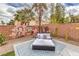 Backyard lounge area featuring playful wall murals and a charming outdoor space at 5626 Deer Creek Falls Ct, Las Vegas, NV 89118