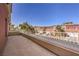 Spacious balcony with railings and panoramic views of the neighborhood rooftops at 5626 Deer Creek Falls Ct, Las Vegas, NV 89118