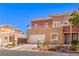 Charming two-story home with a garage, mature palms, and well-kept landscaping at 5626 Deer Creek Falls Ct, Las Vegas, NV 89118