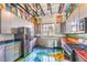 Modern kitchen with stainless steel appliances and colorful accents at 5626 Deer Creek Falls Ct, Las Vegas, NV 89118