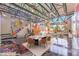 Open living space featuring colorful murals, natural light, dining area, and modern decor for versatile living at 5626 Deer Creek Falls Ct, Las Vegas, NV 89118