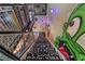 View looking down at the staircase with graffiti art and metal grating at 5626 Deer Creek Falls Ct, Las Vegas, NV 89118