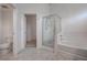 Neat bathroom featuring a walk-in shower, bath tub and toilet at 6436 Point Break St, North Las Vegas, NV 89084