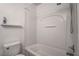 Bathroom with a shower-tub combo and a standard toilet at 6436 Point Break St, North Las Vegas, NV 89084