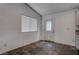 Bright dining area features a window, a door to the backyard, and tile flooring at 6436 Point Break St, North Las Vegas, NV 89084