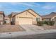 Charming single-story home with a two-car garage and low-maintenance landscaping at 6436 Point Break St, North Las Vegas, NV 89084