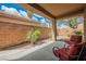Inviting backyard patio with comfortable chairs, a peaceful garden, and a calming outdoor ambiance at 6737 Divers Loons St, North Las Vegas, NV 89084