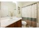 Bathroom featuring a vanity with sink, toilet, and shower with tub combo at 6737 Divers Loons St, North Las Vegas, NV 89084