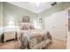Charming bedroom with natural light and a comfortable bed at 6737 Divers Loons St, North Las Vegas, NV 89084