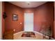 Inviting entryway features tile flooring, a vibrant wall color and tasteful decor at 6737 Divers Loons St, North Las Vegas, NV 89084