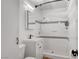 This bathroom features a tiled shower, a newer vanity and a toilet at 7 Church St, Henderson, NV 89015