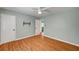 This bedroom features wood-look flooring and a TV mounting bracket on the wall at 7 Church St, Henderson, NV 89015