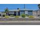 Charming single-story home with a well-maintained front yard and blue exterior at 7 Church St, Henderson, NV 89015