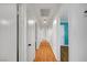 Hallway with wood floors and ample access to rooms at 7 Church St, Henderson, NV 89015