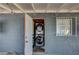 This is a laundry area with a stacked washer and dryer, accessible from the exterior at 7 Church St, Henderson, NV 89015