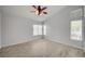 Bright Primary bedroom with ceiling fan and multiple windows for lots of light at 7888 Bonaventure Dr, Las Vegas, NV 89147