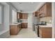 Stylish kitchen with tile backsplash, stainless steel appliances, and ample cabinet space at 7888 Bonaventure Dr, Las Vegas, NV 89147