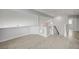 Upstairs loft area showing the staircase and railing. Wood floors throughout at 7888 Bonaventure Dr, Las Vegas, NV 89147