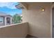 Balcony with decorative wall overlooking the surrounding landscape at 8805 Jeffreys St # 2020, Las Vegas, NV 89123