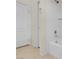 Bathroom including a shower and bathtub combination with white fixtures at 8805 Jeffreys St # 2020, Las Vegas, NV 89123