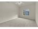 Bright and airy bedroom filled with natural light from a large window at 8805 Jeffreys St # 2020, Las Vegas, NV 89123
