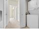 Hallway with a stacked washer and dryer at 8805 Jeffreys St # 2020, Las Vegas, NV 89123