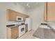 Well-equipped kitchen with wooden cabinets, white appliances, and plenty of counter space at 8805 Jeffreys St # 2020, Las Vegas, NV 89123