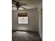 Compact bedroom showcasing tiled floors, ceiling fan, closet, and window at , Henderson, NV 89011
