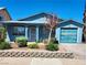 Charming single-story home featuring a well-maintained front yard and attached garage at , Henderson, NV 89011