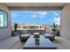 Outdoor balcony with comfortable seating and neighborhood views at 10718 Desert Heights Ave, Las Vegas, NV 89135