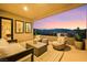 Outdoor balcony with comfortable seating and mountain views at 10718 Desert Heights Ave, Las Vegas, NV 89135