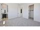 Spacious bedroom with carpet, a full ensuite bathroom, and a walk-in closet at 10718 Desert Heights Ave, Las Vegas, NV 89135