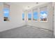 Bright bedroom with multiple windows offering a panoramic view at 10718 Desert Heights Ave, Las Vegas, NV 89135