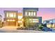 Contemporary home exterior showcasing modern design and a well-manicured front yard at 10718 Desert Heights Ave, Las Vegas, NV 89135
