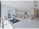 Bright, open loft space with exercise equipment, modern railings and large windows overlooking the valley at 10718 Desert Heights Ave, Las Vegas, NV 89135