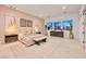 Serene bedroom retreat featuring neutral tones, modern lighting, and plenty of natural light at 10718 Desert Heights Ave, Las Vegas, NV 89135