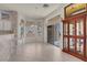 Eat-in kitchen dining area with tile flooring and backyard access at 11032 Mission Lakes Ave, Las Vegas, NV 89134