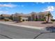 Single-story home featuring a low-maintenance desert landscape at 11032 Mission Lakes Ave, Las Vegas, NV 89134