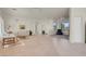 Spacious living room with large windows offering plenty of natural light and tile accents at 11032 Mission Lakes Ave, Las Vegas, NV 89134
