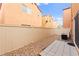 Low-maintenance backyard featuring gravel and a small paved patio at 11135 Abbeyfield Rose Dr, Henderson, NV 89052