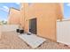 Backyard featuring gravel, patio, and access to home with sliding glass door at 11135 Abbeyfield Rose Dr, Henderson, NV 89052