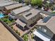 Aerial view of the backyard with a covered patio and desert landscaping at 1124 Aspen Cliff Dr, Henderson, NV 89011