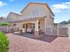 Backyard patio with desert landscaping and privacy fencing at 1124 Aspen Cliff Dr, Henderson, NV 89011