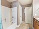 Neutral bathroom features a shower-tub combo with a handheld sprayer at 1124 Aspen Cliff Dr, Henderson, NV 89011