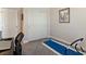 Bright bedroom with carpet, art and an exercise mat for a flexible workout space at 1124 Aspen Cliff Dr, Henderson, NV 89011