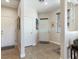 Bright and welcoming foyer with tile flooring, neutral walls, and access to multiple rooms at 1124 Aspen Cliff Dr, Henderson, NV 89011